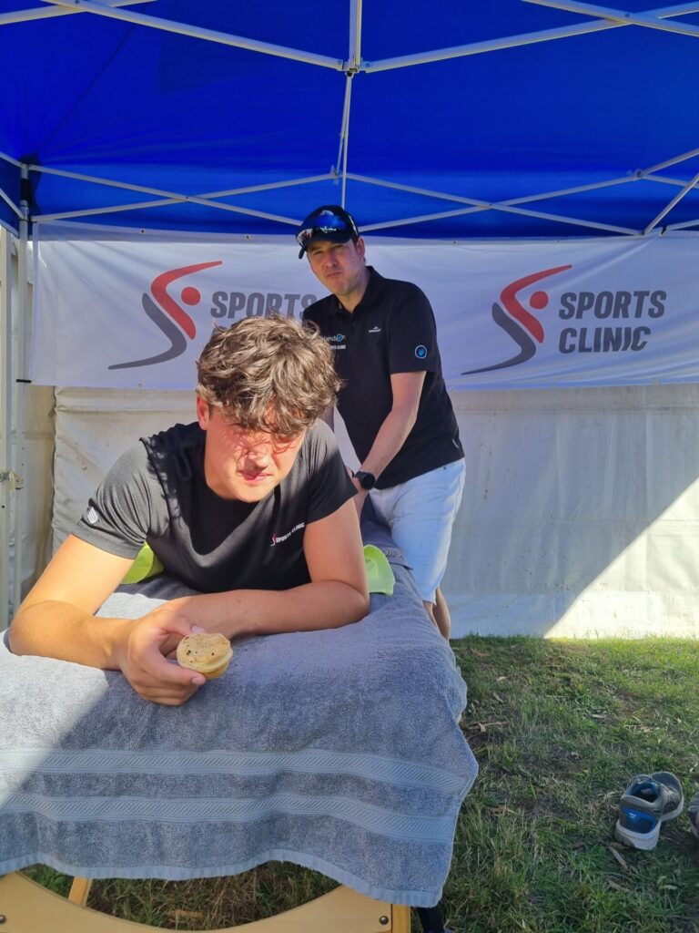 Athlete receiving sports massage from Hans