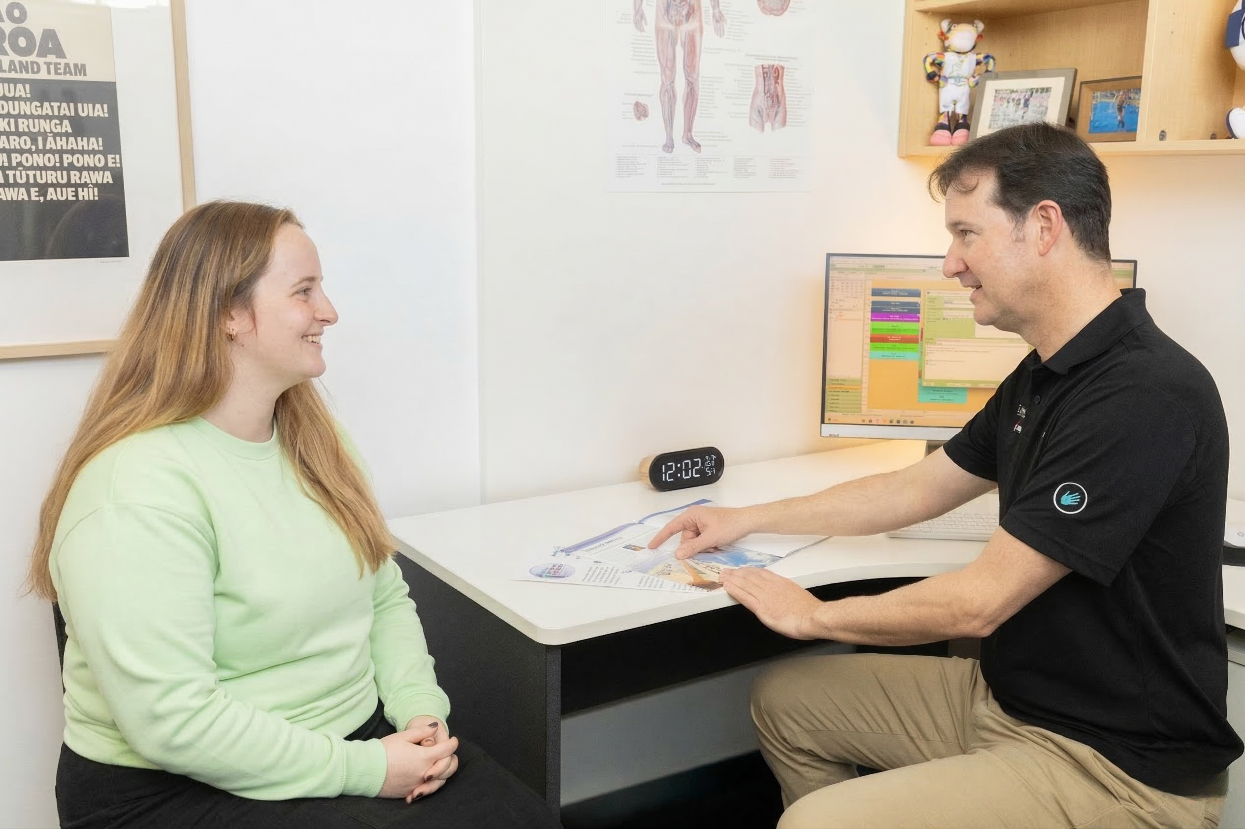 Hans Lutters providing a specialised lymphatic consultation to a client at Hands On Clinic in Christchurch