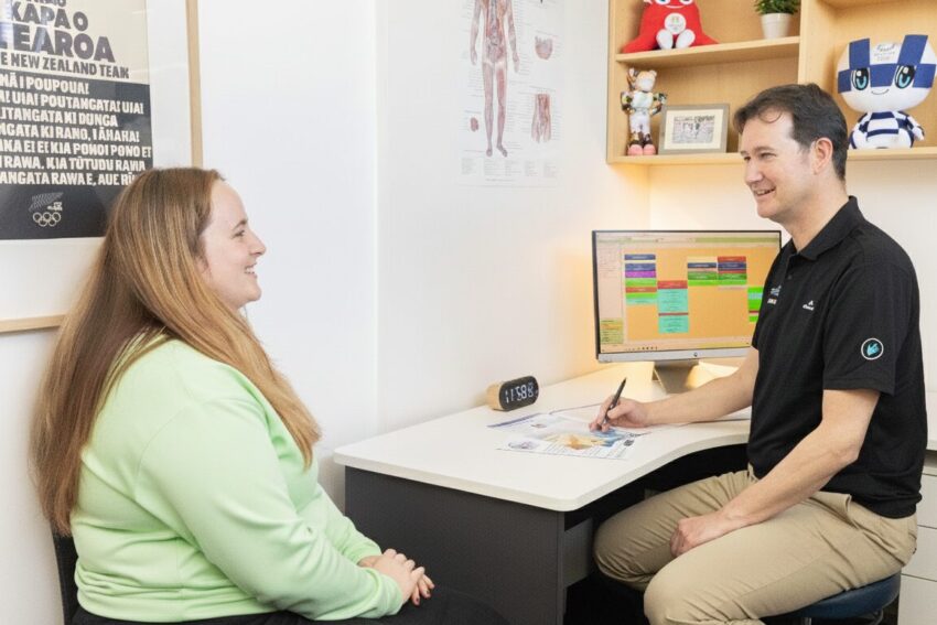 Lymphatic Drainage Consultation Christchurch Director Hans Lutters providing a comprehensive manual lymphatic drainage consultation to a patient at Hands On Clinic in Christchurch.